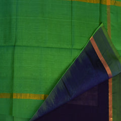 Silk cotton royal blue saree with shot green boarder
