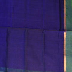 Silk cotton royal blue saree with shot green boarder