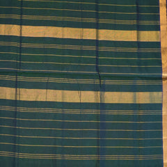 Silk cotton rama green saree with jari boarder.