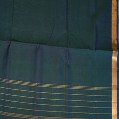 Silk cotton rama green saree with jari boarder.