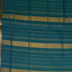 Silk cotton shot green saree with jari boarder.