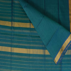 Silk cotton shot green saree with jari boarder.