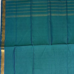 Silk cotton shot green saree with jari boarder.