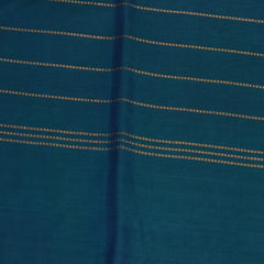 Silk cotton shot green saree with jari boarder.