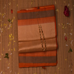 Silk cotton cream saree with orange boarder
