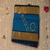 Silk cotton aqua blue saree with jari boarder