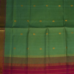 Silk cotton pista green saree with pink jari boarder