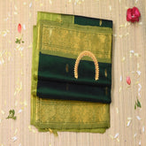 Silk cotton bottle green saree with jari boarder