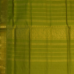 Silk cotton bottle green saree with jari boarder