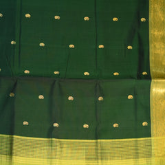 Silk cotton bottle green saree with jari boarder