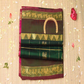 Silk cotton bottle green saree with jari boarder