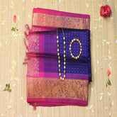 Silk cotton navy blue saree with pink boarder