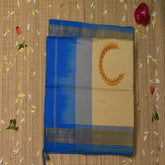 semi cotton beige saree with blue boarder