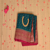 Benarasi crepe silk rama green saree with pink jari boarder