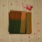 Semi silk cotton green saree with jari boarder