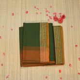 Semi silk cotton green saree with jari boarder