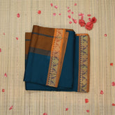 Semi silk cotton green saree with jari boarder