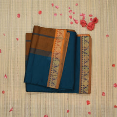 Semi silk cotton green saree with jari boarder