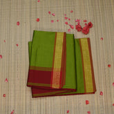 Semi silk cotton green saree with jari boarder