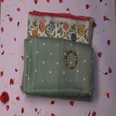 Benarasi georgette pastel green saree with multi color boarder
