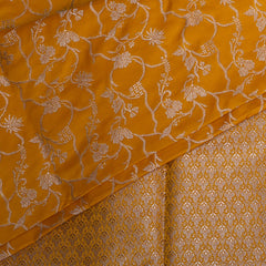 Art silk benarasi yellow saree with silver jari boarder