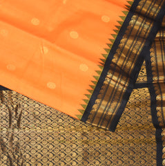 Gadwal pure silk sunrise orange saree with jari boarder