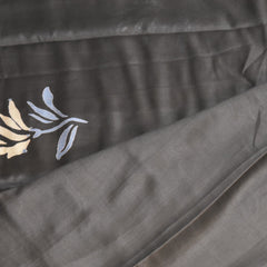 Soft Tussar black saree with jari boarder