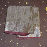 Semi Silk Cotton green saree with jari boarder