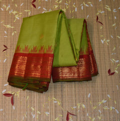 Gadwal pure silk Parrot green saree with jari boarder