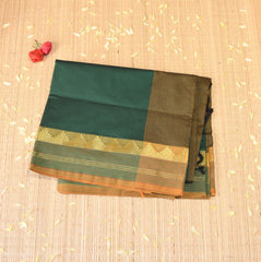 Kanchi Semi Cotton Silk Bottle green saree with jari boarder