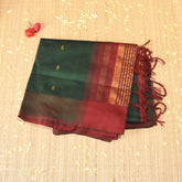 Kanchi pure Silk Bottle green saree with jari motifs
