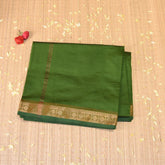 Semi Silk Cotton Dark green saree with jari boarder