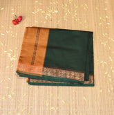 Kanchi Semi Cotton Silk Bottle green saree with jari boarder
