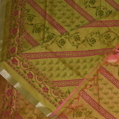 Semi Silk Cotton Pista green saree with floral print