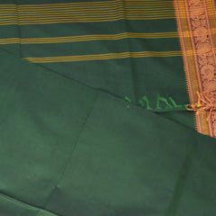 Kanchi Cotton Bottle Green saree with thread boarder