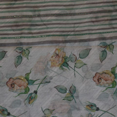 Elegant White Cotton Saree with Pine Green Floral Embellishments