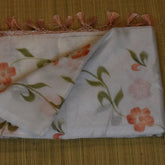 Refined White Cotton Saree with Chestnut-Toned Floral Patterns