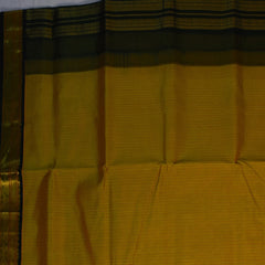 Silk Cotton mustard yellow saree with bottle green jari boarder