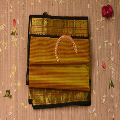 Silk Cotton mustard yellow saree with bottle green jari boarder