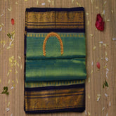 Silk cotton parrot green saree royal blue boarder