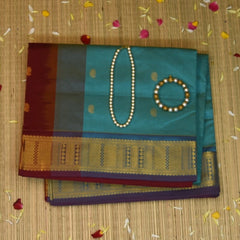 Kanchi Silk Cotton Aqua Green Saree With Zari Border