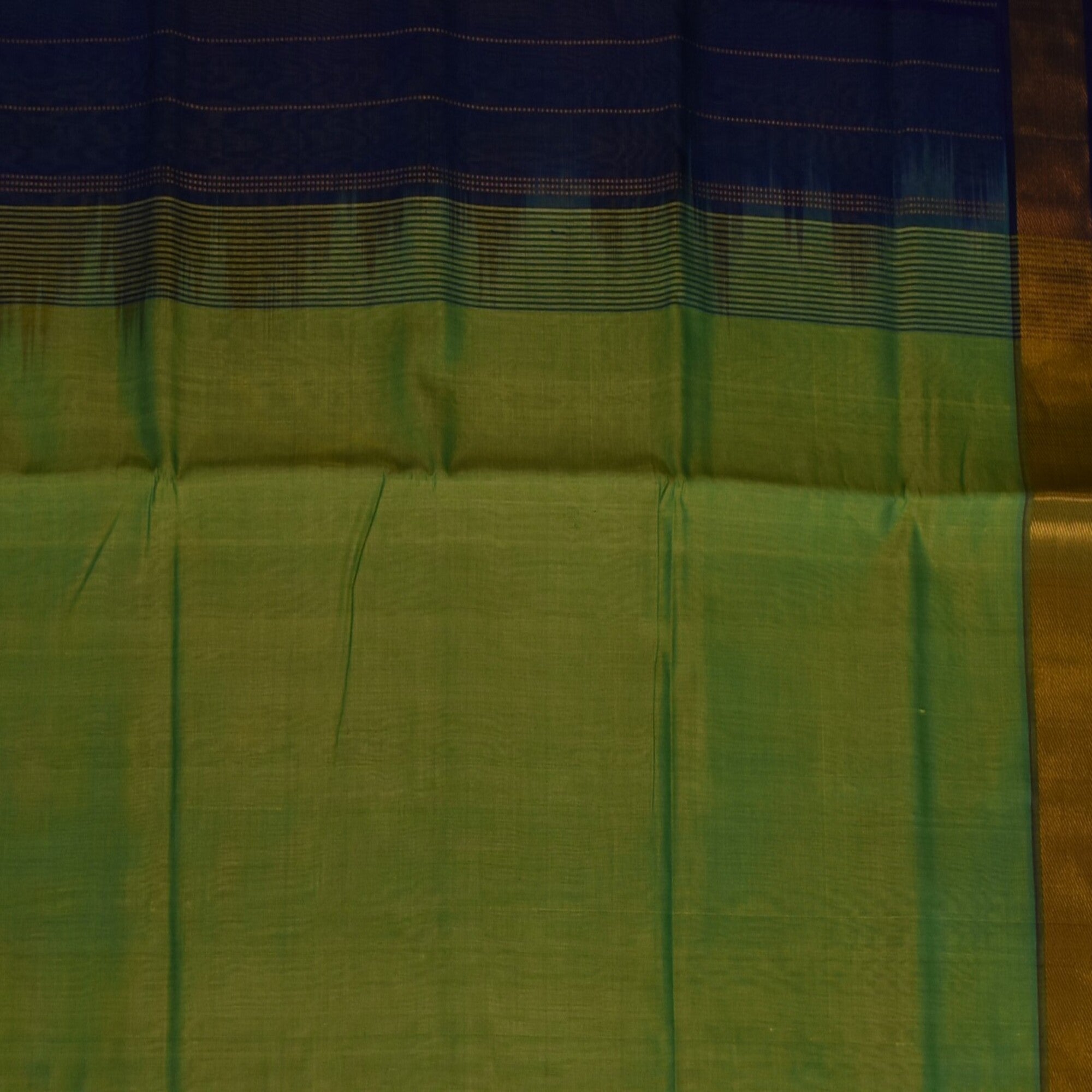 Silk cotton shot green saree with jari boarder
