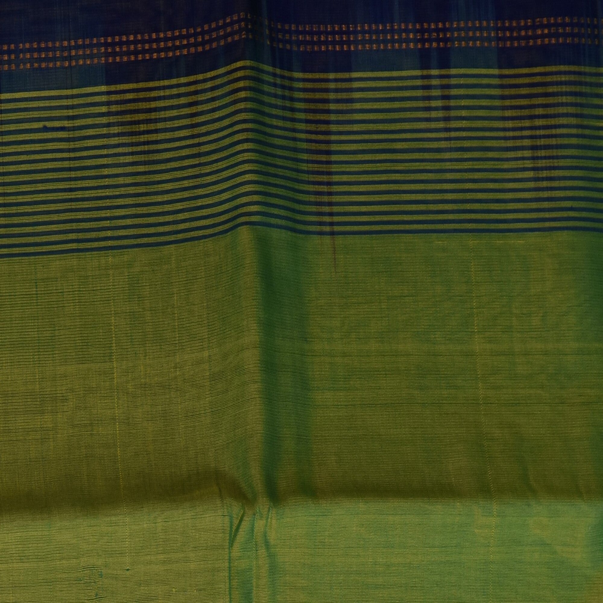 Silk cotton shot green saree with jari boarder