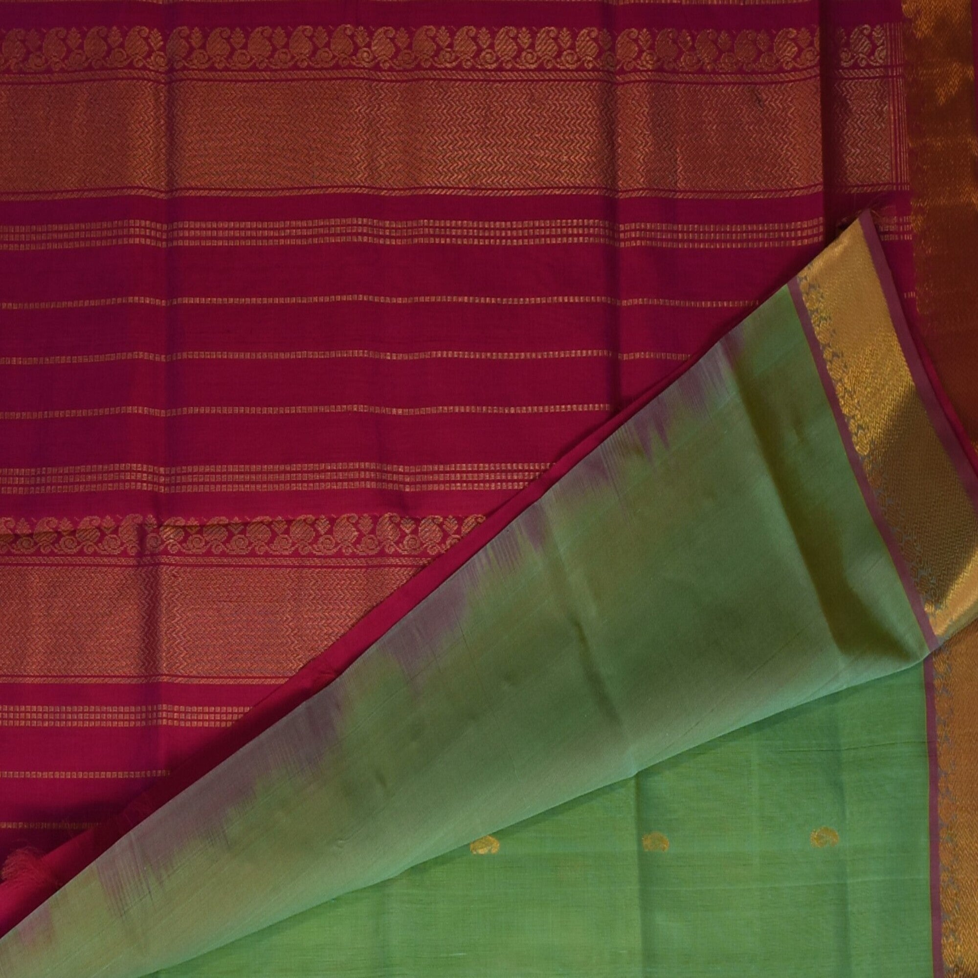 Silk cotton pista green saree with pink jari boarder