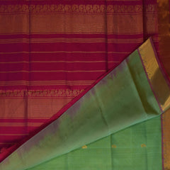 Silk cotton pista green saree with pink jari boarder
