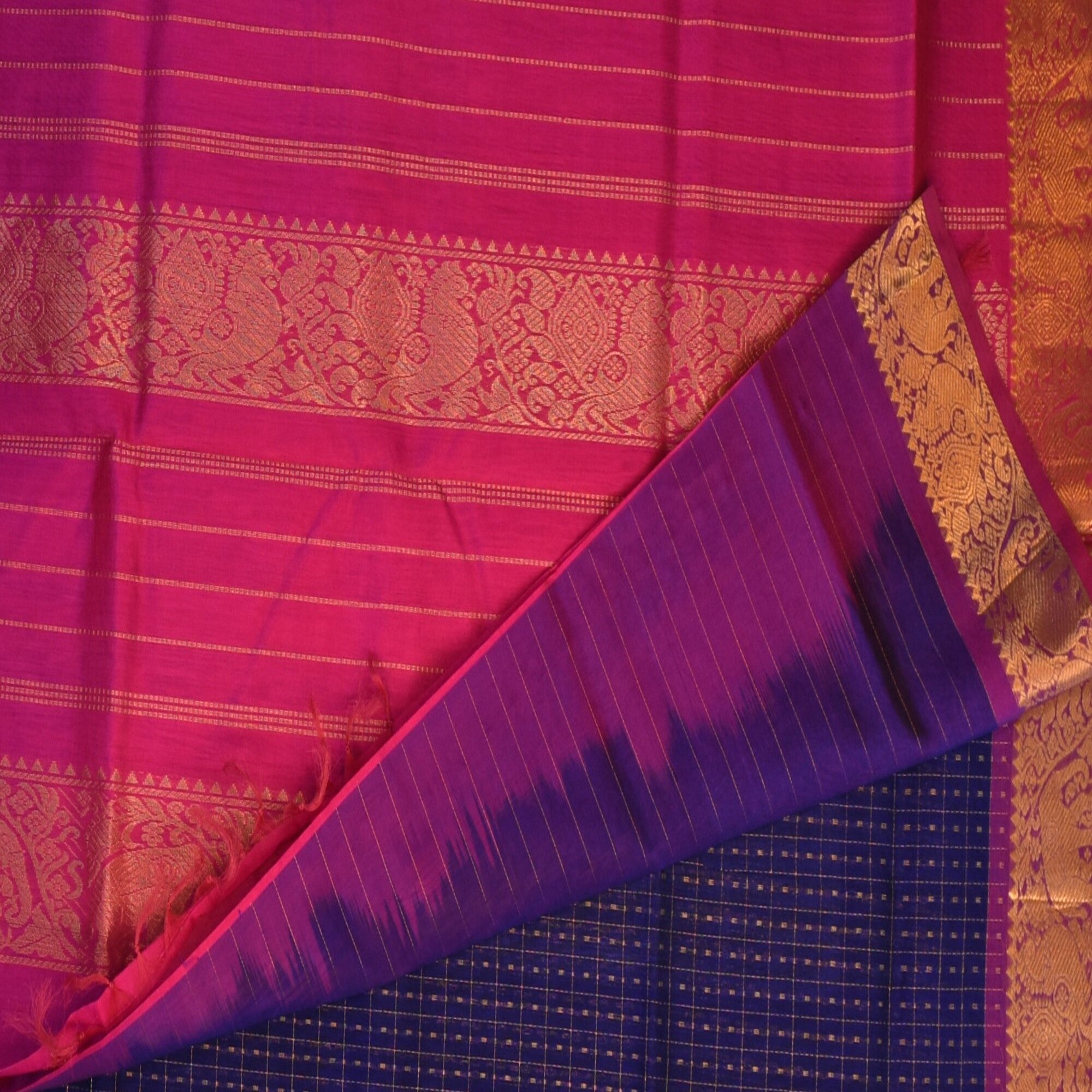Silk cotton navy blue saree with pink boarder