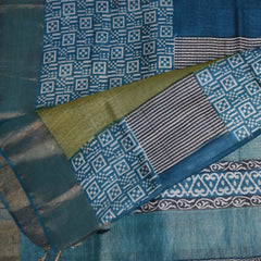Organza silk half white saree with teal blue boarder