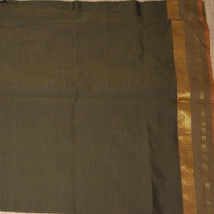 Kanchi Semi Cotton Silk Bottle green saree with jari boarder
