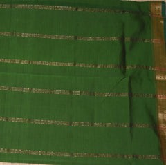 Semi Silk Cotton Dark green saree with jari boarder