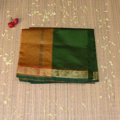 Kanchi Semi Cotton silk Dark green saree with jari boarder
